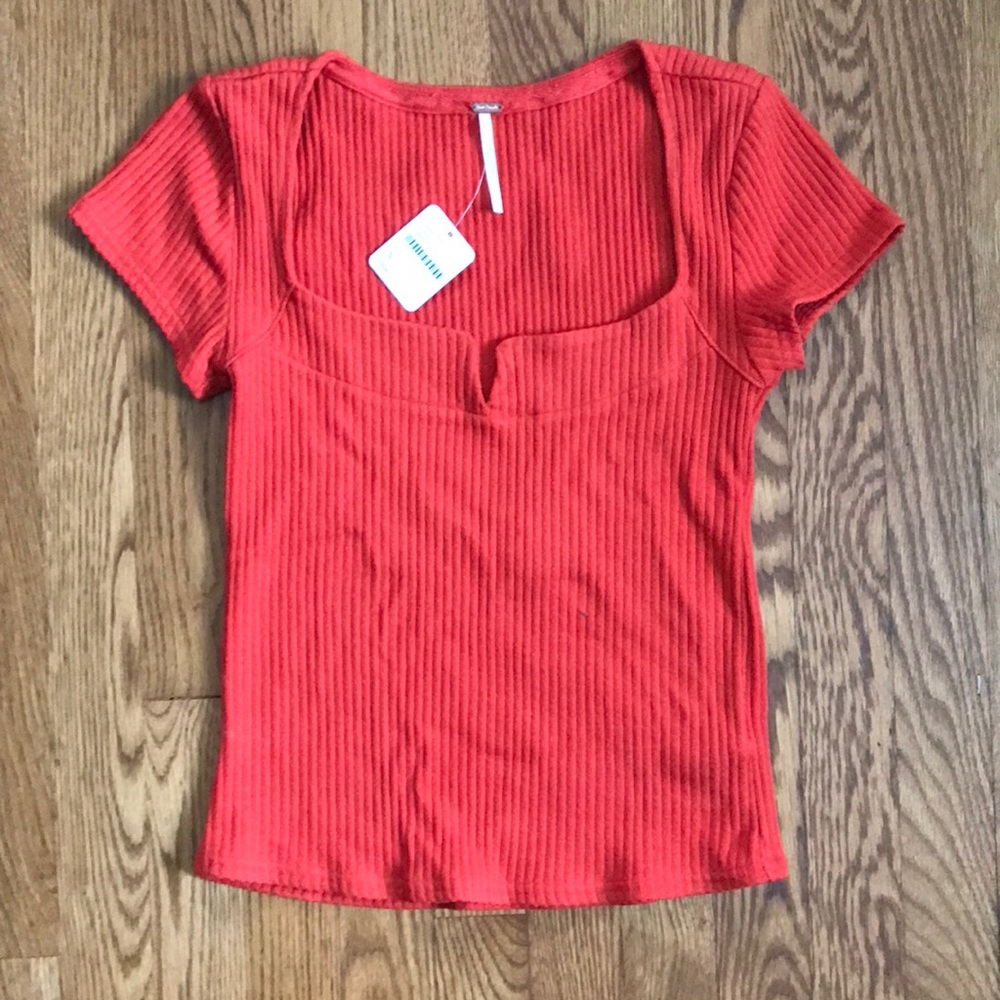 Free people orange/red “notch your girl” short sleeve top size small